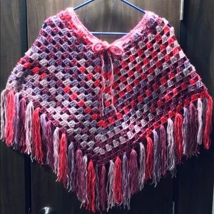 Child’s crochet poncho and matching beanie